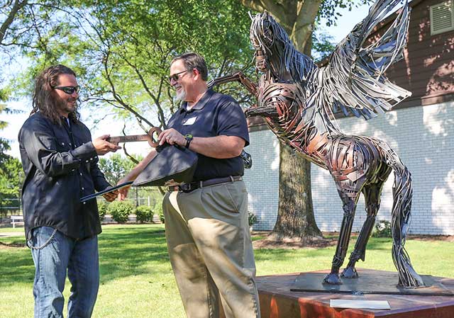 Local Sculptor, Greg Mendez received Key to the City
